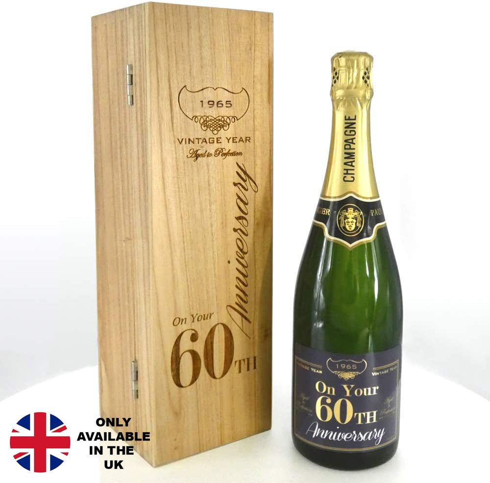 Bouteille de champagne 75 cl personnalisée pour le 60e anniversaire de la naissance d&#39;un enfant, présentée dans une boîte en bois gravée.